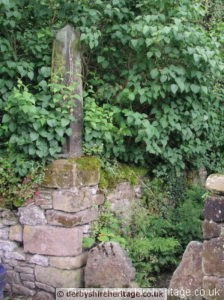 cross in wall at Alport