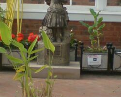 Queen's Park conservatory statue
