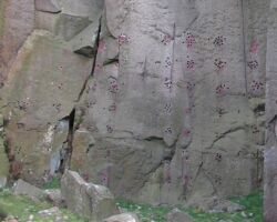 Millstone Edge drill holes in quarry wall